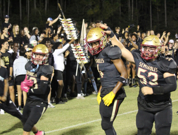 Senior Night and HoCo… Noles Play Lights-Out Football on Black Out Night